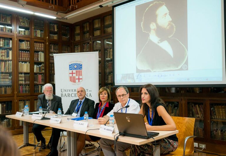 Panel of experts speaking at the Gaudí World Congress 2016 in Universitat de Barcelona, with a unrevealed portrait of Antoni Gaudí displayed