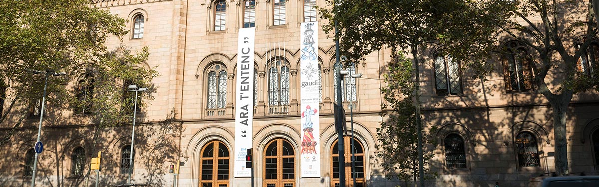 Exterior of Universitat de Barcelona with banners for Gaudí World Congress 2016